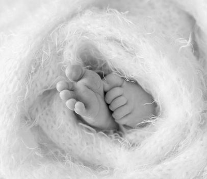 Little feet and toes of infant sleeping