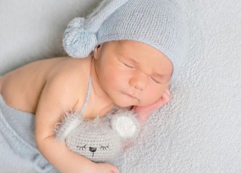 Portrait of infant baby boy sleeping