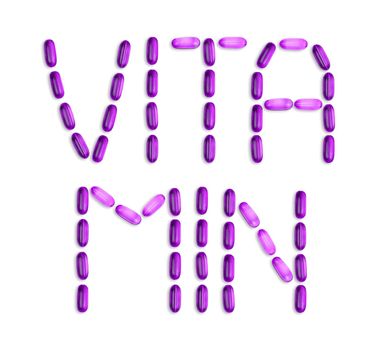 The word Vitamin is laid out with pills. The word Vitamin is laid out with gel pills on a white background with copy space for text