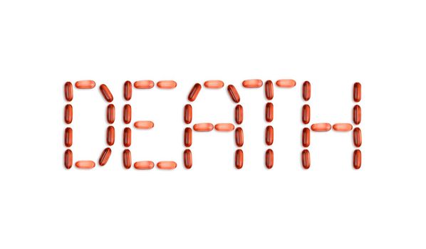 The word Death is laid out with pills. The word Death is laid out with gel pills on a white background with copy space for text