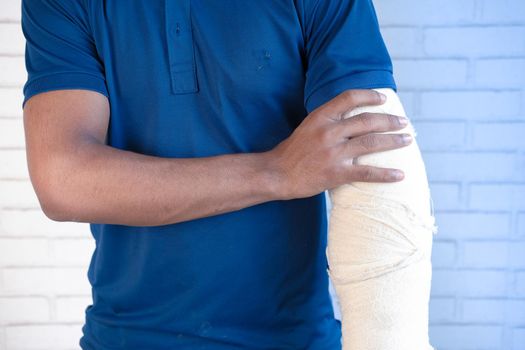 injured painful hand with bandage