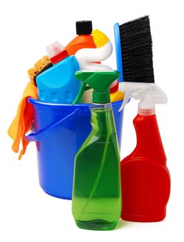Liquid detergents and cleaning supplies in plastic bucket on white background