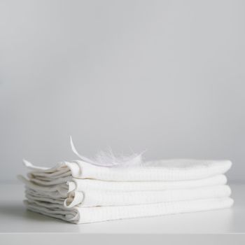 front view stacked white towels