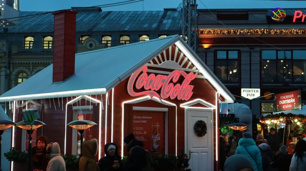 Ukraine, Kiev - January 15, 2019. House with Coca Cola during the Christmas festival. Coca Cola is a leading manufacturer of carbonated drinks in the world.