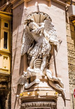 statue on a street of Valletta
