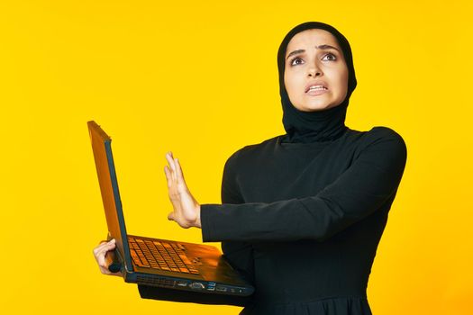 pretty woman arab clothing laptop technology internet ethnicity model