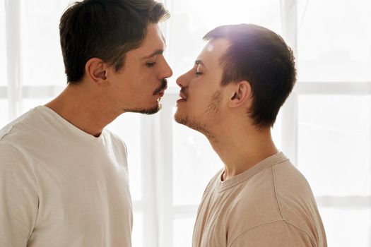 Gay couple of men kissing