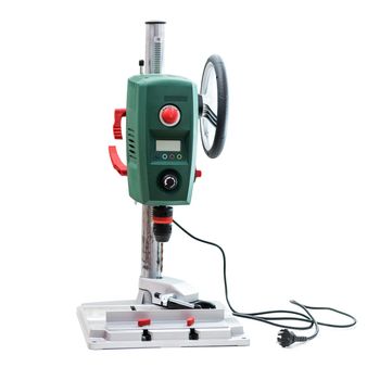 Bench-mounted drill press isolated