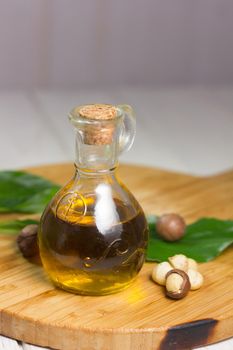 Macadamia oil in a glass bottle.