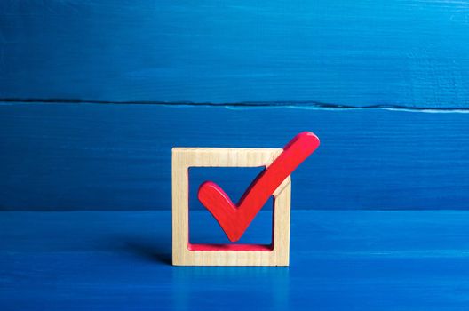Red voting check mark on a blue background. Voting concept for democratic elections. Make the best choice, solve the problem. Social poll. Rights and freedoms. Lawmaking. Approval symbol