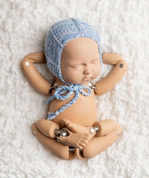 Toy of newborn baby for photo practice
