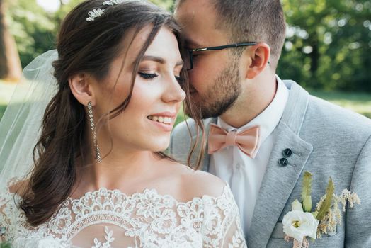 Wedding photography kiss bride and groom in different locations