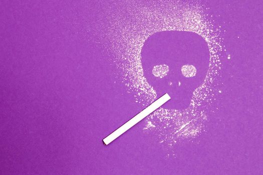 silhouette of a skull with a cigarette on a purple background, copy space, top view, harm of smoking concept