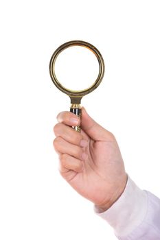hand holding a Brass Magnifying Glas