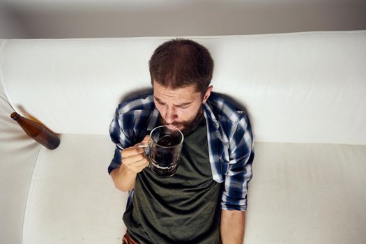 bearded man beer alcohol emotions fun light background