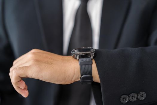 hand of business man with smart watch