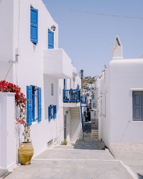 Mykonos Greece , colorful streets of the old town of Mykonos with tourist in the street