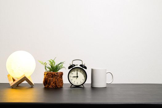 Lamps and clocks are at your desk.