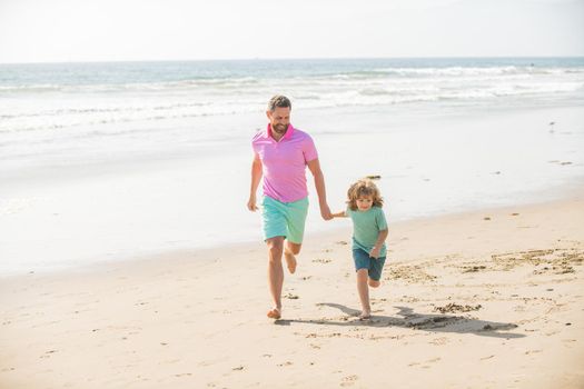 father and son run on summer beach, lifestyle