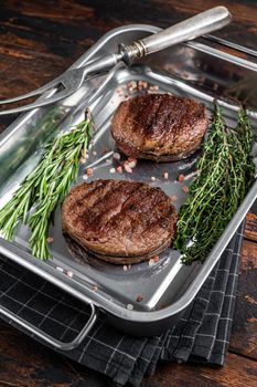 BBQ Grilled Tenderloin meat steaks, Fillet Mignon. Wooden background. Top view