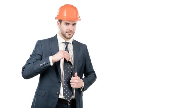 Civil engineer man in hardhat put money cash in jacket pocket isolated on white copy space, earnings