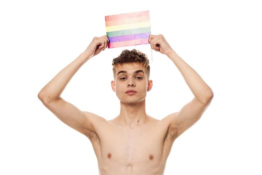 a man with a naked torso Flag lgbt Facial makeup homosexual light background