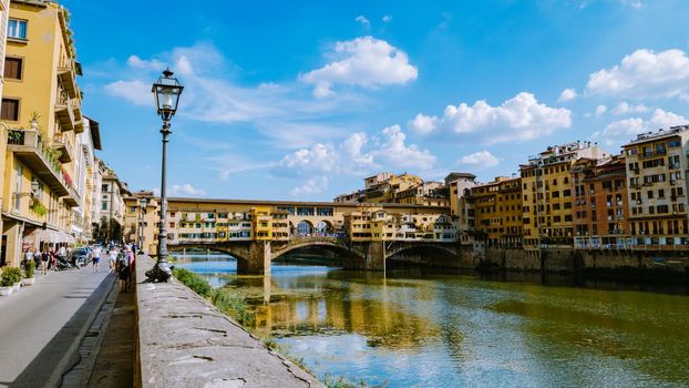 Ponte Vecchio bridge over the Arno River in Florence Italiy, colourful bridge over the river in Florence