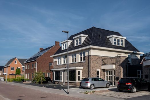 Dutch Suburban area with modern family houses,newly build modern family homes in the Netherlands,dutch family house, appartment house