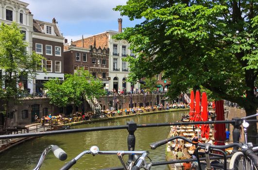 Amazing view on a lot of outdoor cafes alongside the Oudegracht (Old Canal) in the center of Utrecht, Netherlands