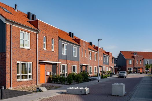 Dutch Suburban area with modern family houses,newly build modern family homes in the Netherlands,dutch family house, appartment house