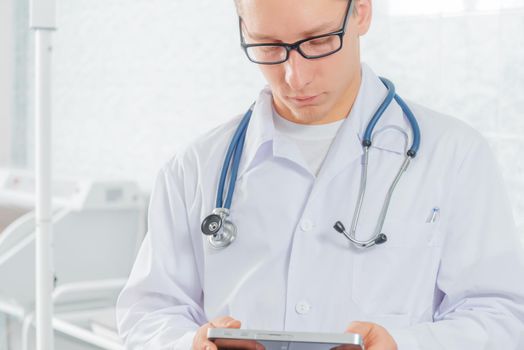Doctor with a tablet PC