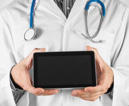 Unrecognizable man doctor holding a tablet PC