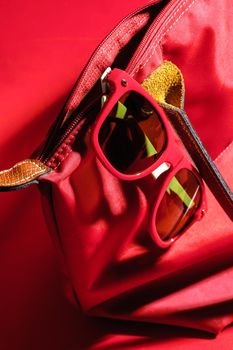 red plastic sunglasses