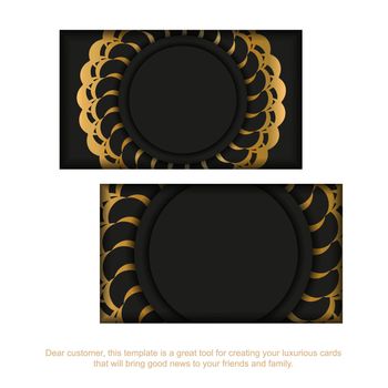 Black business card with golden Greek ornament
