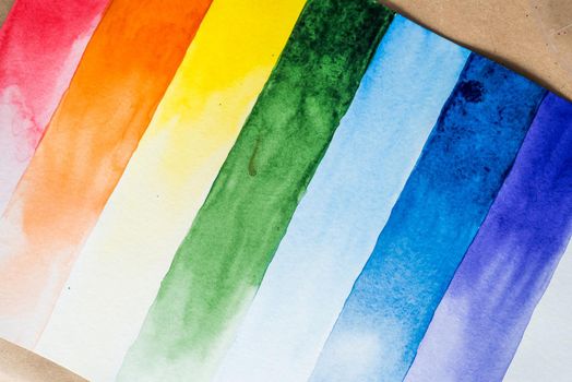 Rainbow watercolor composition in separated stripes