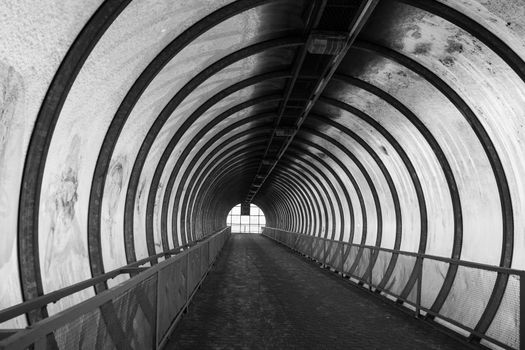 Light at the end of tunnel black and white.