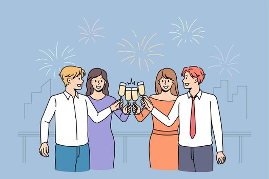 Happy diverse people celebrate cheers glasses together