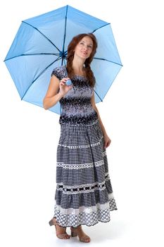 Beautiful woman walking under umbrella