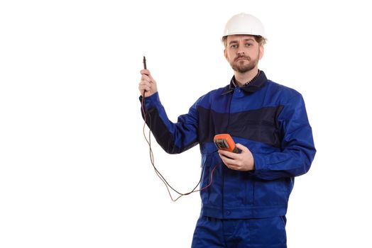 engineer in helmet and uniform with tester