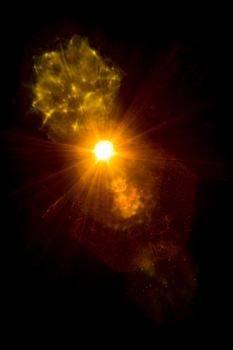 Abstract imitation sun starlight distant galaxy on a black background.