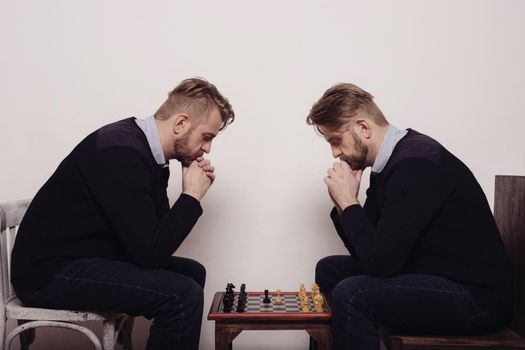 man playing chess against himself