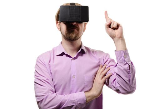 nice man with glasses of virtual reality in lilac shirt