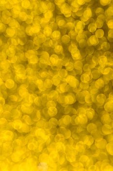 Abstract christmas lights glitter background. christmas gold texture background