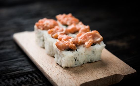 set of sushi rolls with salmon