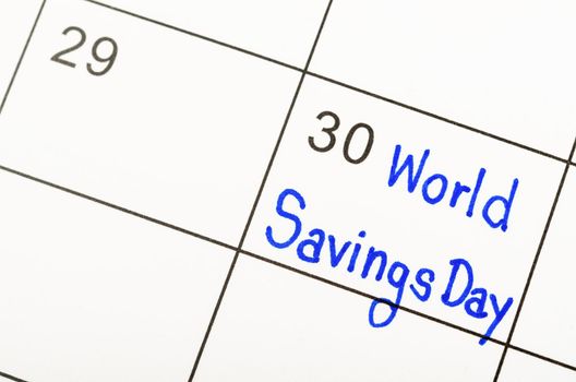 World savings day marked on a white calendar.