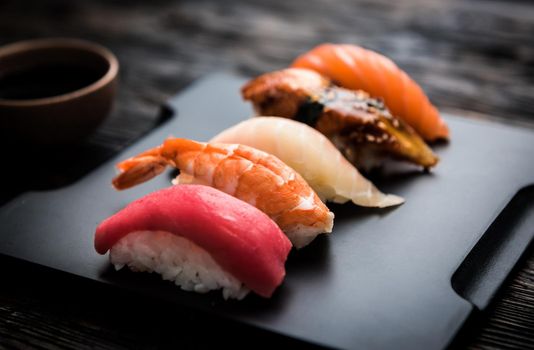 sashimi sushi set with chopsticks and soy