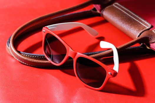 red plastic sunglasses