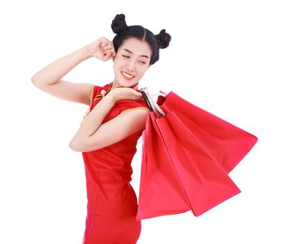 woman holding shopping bag on chinese new year celebration isolated on white background