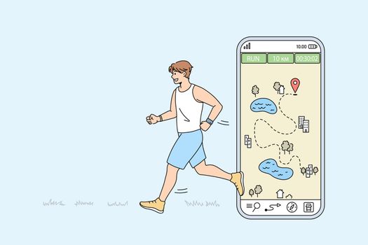 Healthy man in sportswear run using cellphone app