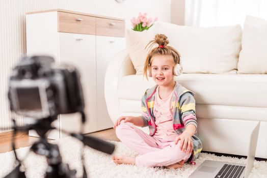 Little girl recording video